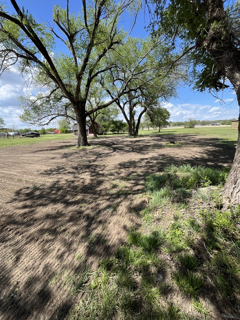 Lifted Construction LLC grading and leveling a building pad in Rogers County, Oklahoma